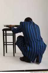 Garson KILLMASTER KNEELING POSE WITH SHOTGUN